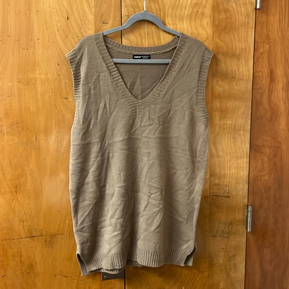 Brown sweater vest